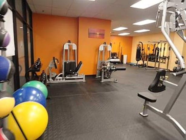 Fitness center interior with strength equipment